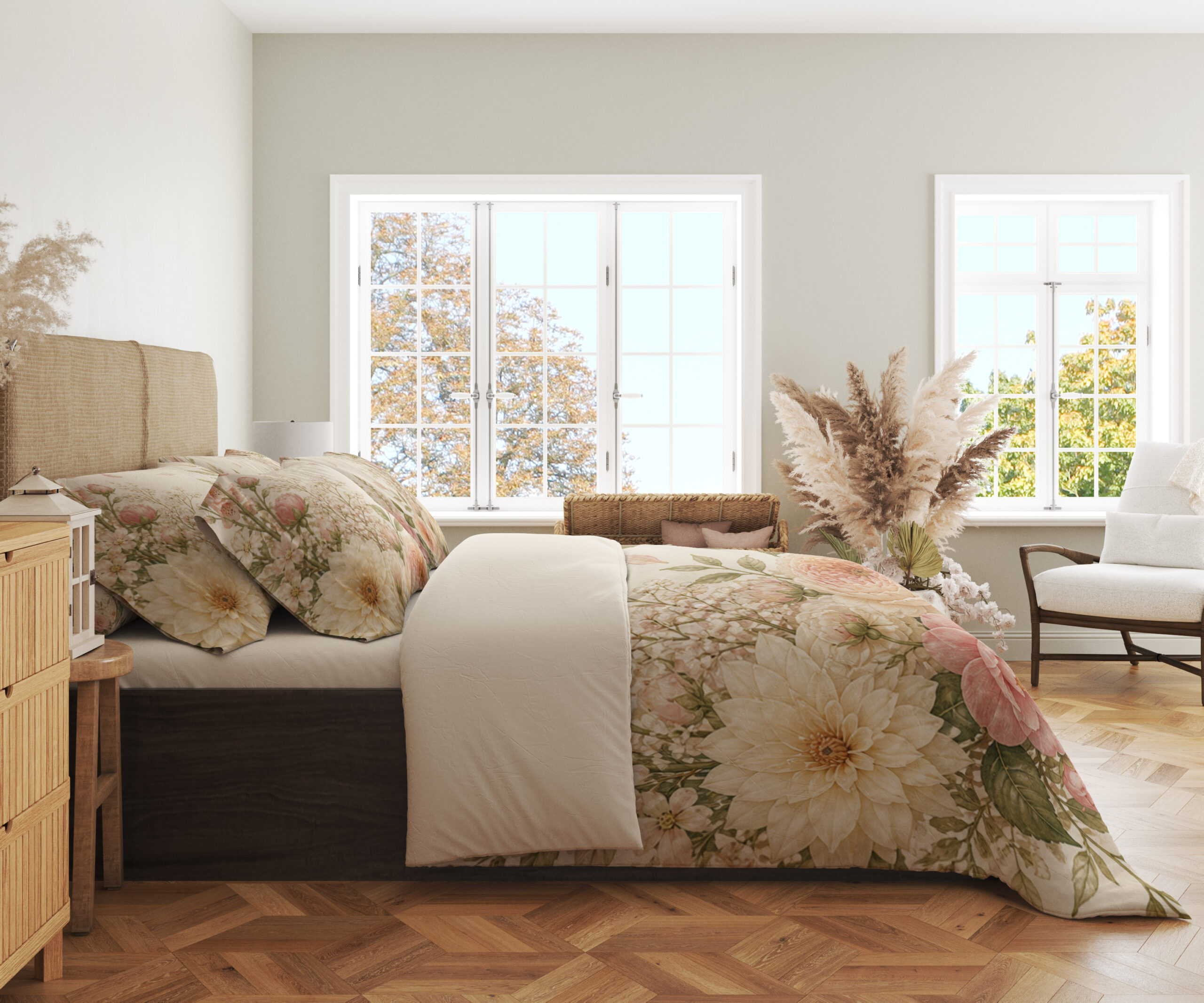 Side view of ivory bedding with large blush-pink and peach flowers, cream blooms, airy white flower clusters and soft green leaves, showing the print across the draped cover.