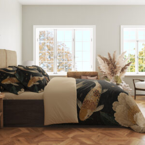 Side view of charcoal bedding printed with cream and rust koi, large taupe peonies and fine swirling pond ripples, showing the print across the draped cover.