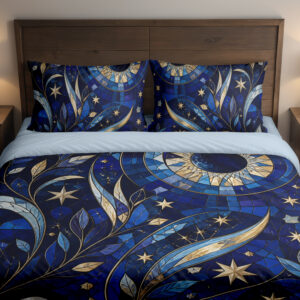 Front close view of cobalt bedding with mosaic-like blue leaves, sweeping golden crescents, pale stars and a large circular celestial motif on the cover and matching pillows.