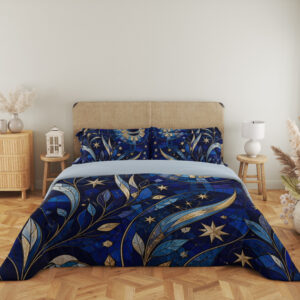 Full front view of cobalt bedding with mosaic-like blue leaves, sweeping golden crescents, pale stars and a large circular celestial motif beneath a beige headboard.
