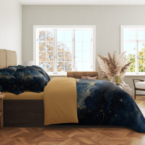 Side view of navy sky-print bedding with dark-blue clouds, fine golden edging and scattered tiny stars.