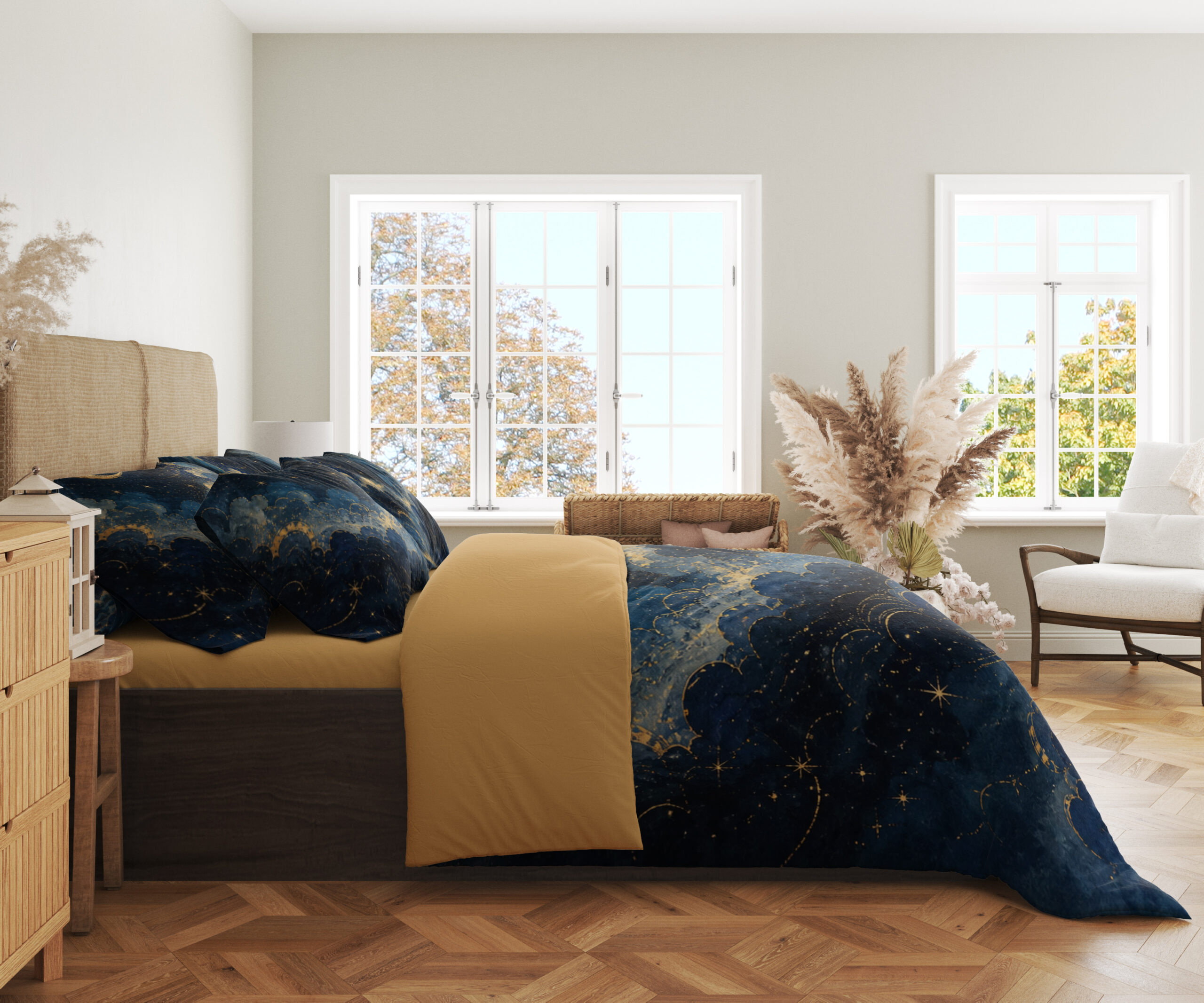 Side view of navy sky-print bedding with dark-blue clouds, fine golden edging and scattered tiny stars.