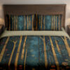 Front close view of deep teal bedding with tall slender golden tree trunks, tiny coral flowers and scattered blue-green leaf sprigs on the cover and matching pillows.
