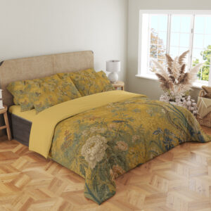 Angled full-bed view of ochre yellow bedding printed with small birds, slender flowering branches, ivory blooms and muted green foliage, showing the pattern across the cover and pillows.