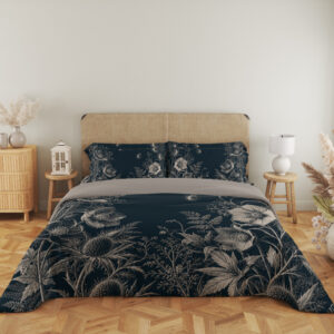 Full front view of deep teal bedding with fine ivory line drawings of open flowers, spiky seed heads, fern-like leaves and tiny floating seeds beneath a beige headboard.