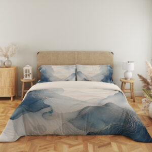 Full front view of bedding printed with layered misty blue and gray watercolor contours, fine pale lines and an open ivory center beneath a beige headboard.