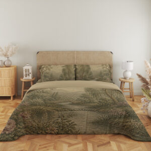 Full front view of muted sage-and-cream bedding with a wooded river landscape, layered trees, distant hills and small pink flowers along the banks beneath a beige headboard.