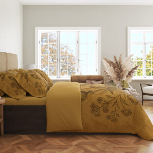 Side view of ochre bedding with detailed sepia peonies, layered petals, rounded buds and slender leafy stems, showing the print across the draped cover.