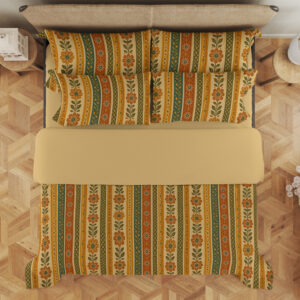 Overhead view of bedding with narrow vertical saffron, cream, orange and olive stripes filled with tiny folk flowers, leaf stems and dotted borders, with the design repeated on the pillows.