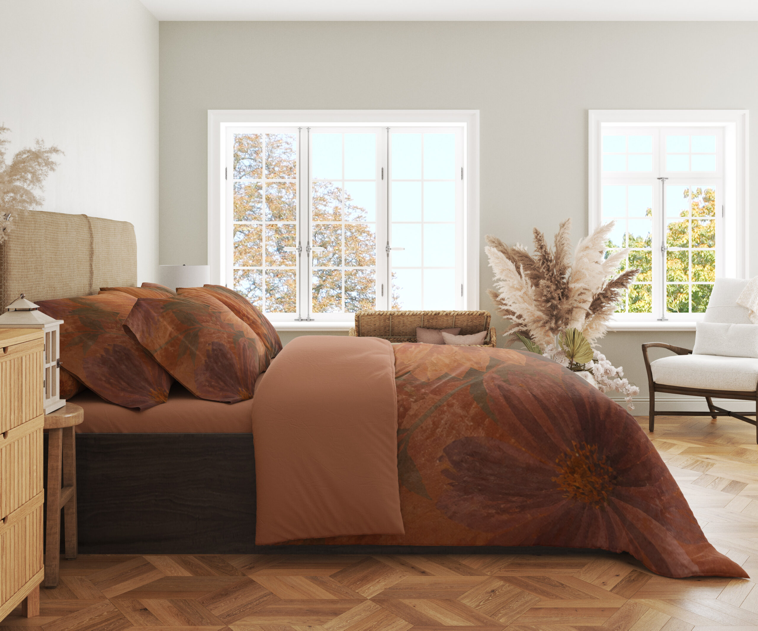 Side view of terracotta bedding with large softly painted orange dahlias, muted burgundy petals and shadowy olive leaves, showing the print across the draped cover.