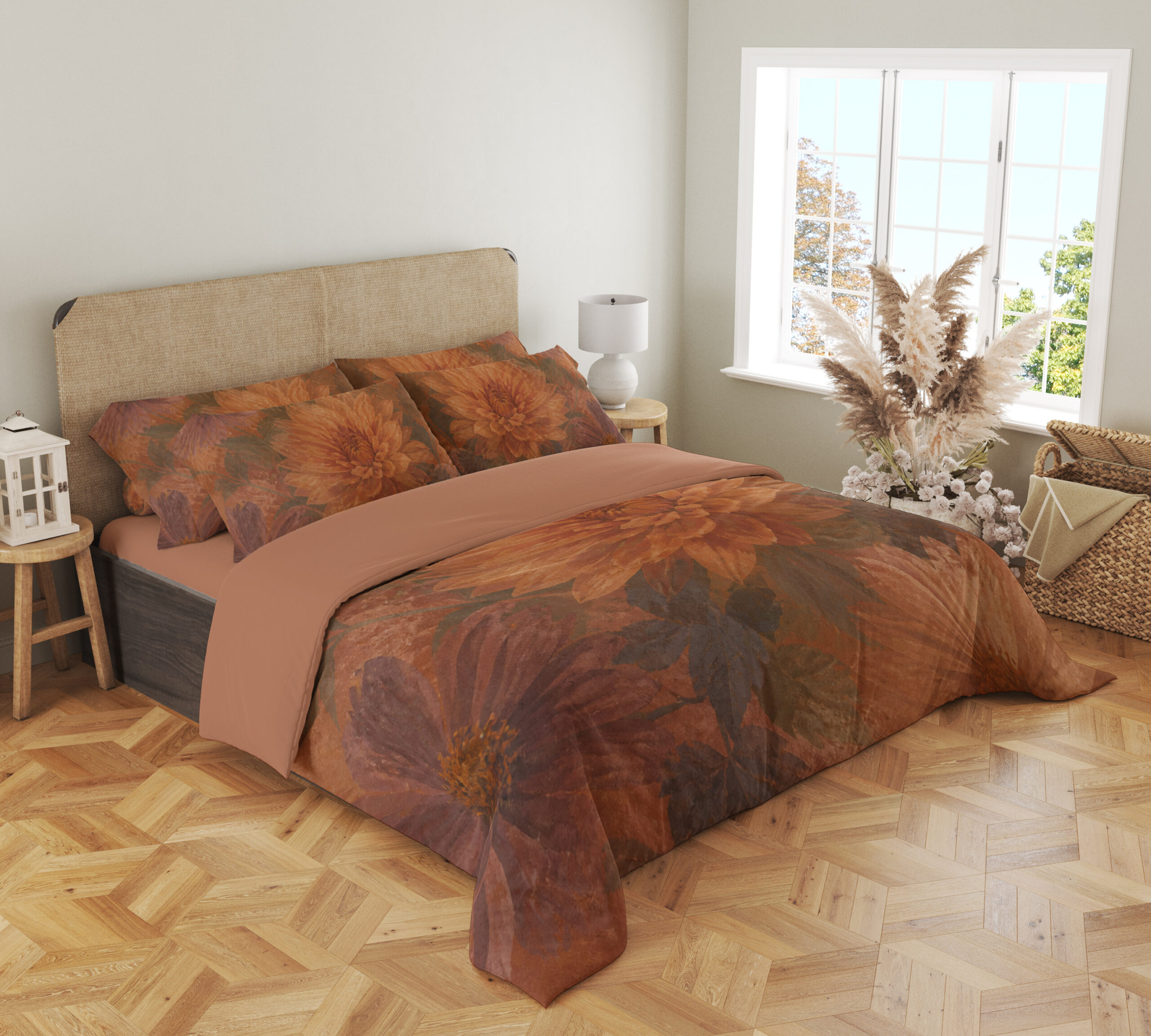 Angled full-bed view of terracotta bedding with large softly painted orange dahlias, muted burgundy petals and shadowy olive leaves, showing the pattern across the cover and pillows.