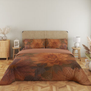 Full front view of terracotta bedding with large softly painted orange dahlias, muted burgundy petals and shadowy olive leaves beneath a beige headboard.