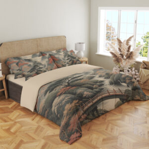 Angled full-bed view of bedding printed with a misty gray mountain valley, red-leaved trees, an arched wooden bridge and a white crane, showing the pattern across the cover and pillows.