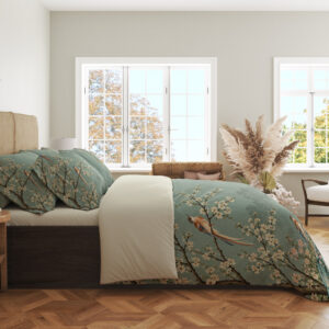 Celadon Blossom Aviary Bedding Set with celadon birds and cream blossoms — side view beside bright bedroom windows