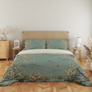 Celadon Blossom Aviary Bedding Set with celadon birds and cream blossoms — front view with an upholstered headboard