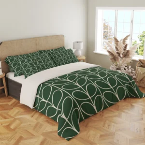 Angled view of ivory outlined leaves on a forest-green duvet, showing the pattern across the top and draped front corner.