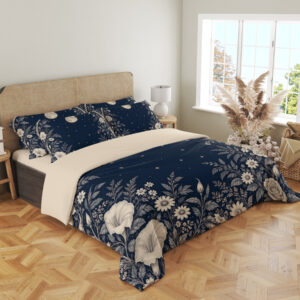 Midnight Moonflower Arbor Bedding Set with navy moon and ivory floral artwork — angled view in a light neutral bedroom