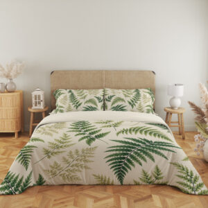 Full front view of ivory bedding printed with scattered forest-green and olive fern fronds of different sizes beneath a beige headboard.