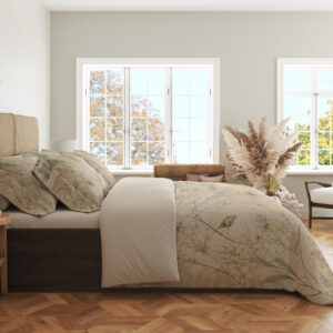Side view of parchment botanical bedding, showing delicate grass stems and small moth motifs on the draped cover.