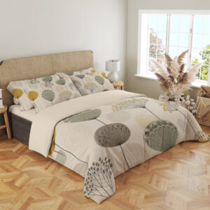 Angled full-bed view of ivory bedding printed with widely spaced sage, mustard and gray rounded seedheads on slender stems, showing the pattern across the cover and pillows.