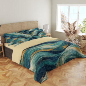 Angled view of Teal Gilded Current bedding, showing sweeping blue-green and gold-colored brushstrokes across the duvet and pillows.