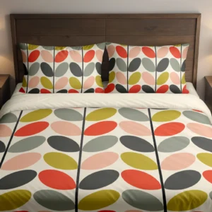 Cream bedding with mustard, peach, red-orange, sage-gray and charcoal oval leaves on dark stems across the duvet and pillows, viewed closely from the front.
