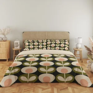 Front view of charcoal bedding with vertical cream stems joining peach-centered flowers and olive leaf medallions, echoed on the pillows.