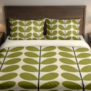 Ivory bedding with broad olive-green leaves and slender charcoal stems running down the duvet and matching pillows, viewed closely from the front.