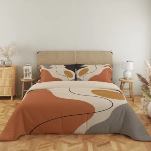 Close frontal view of terracotta and gray organic-print bedding with two ochre-accented pillows and a charcoal curve sweeping across the duvet.